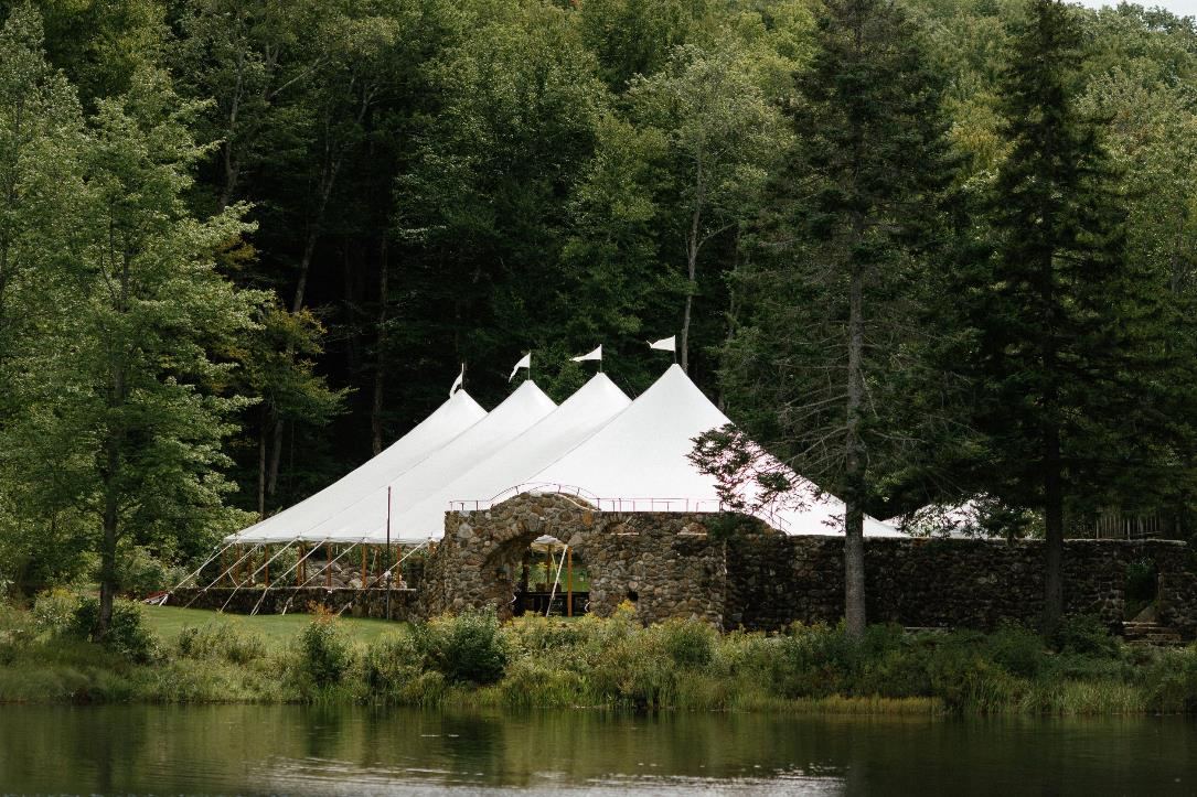 White sailcloth tent at the Walled Garden by Woods Mill Pond